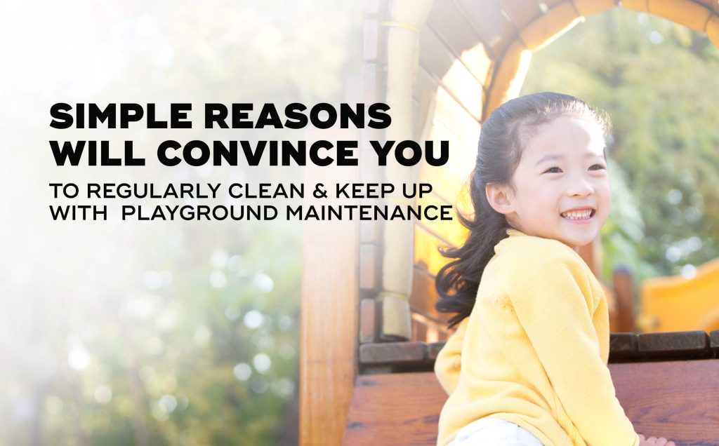 A cheerful girl playing at a playground.