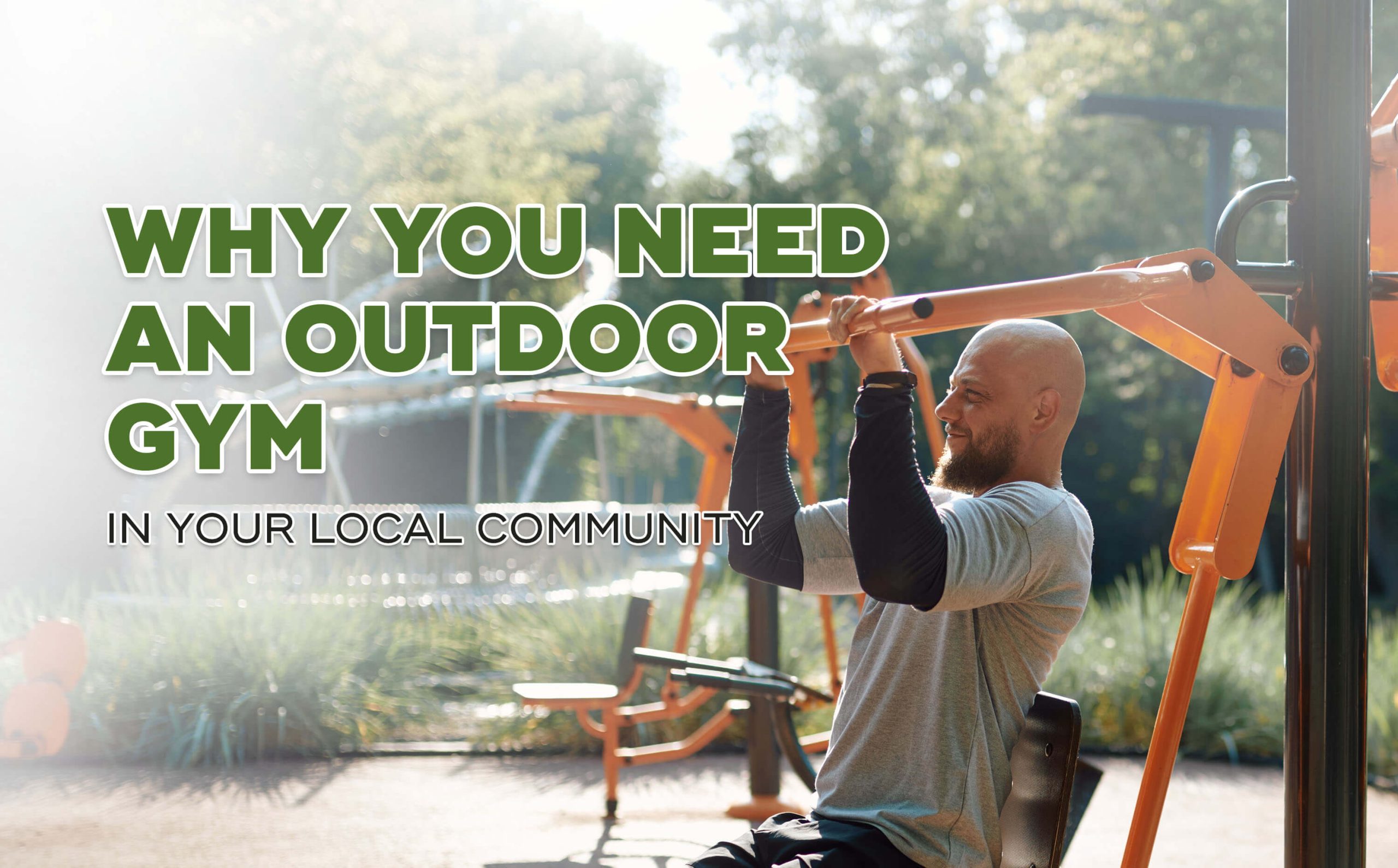 A man using an outdoor gym equipment to exercise.